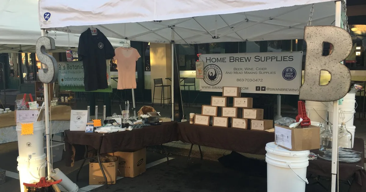 Swan Brewing's original farmers market stall selling home brew supplies at the Lakeland Saturday market, circa 2014